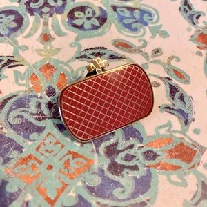 Bottega Veneta knot clutch brooch pin